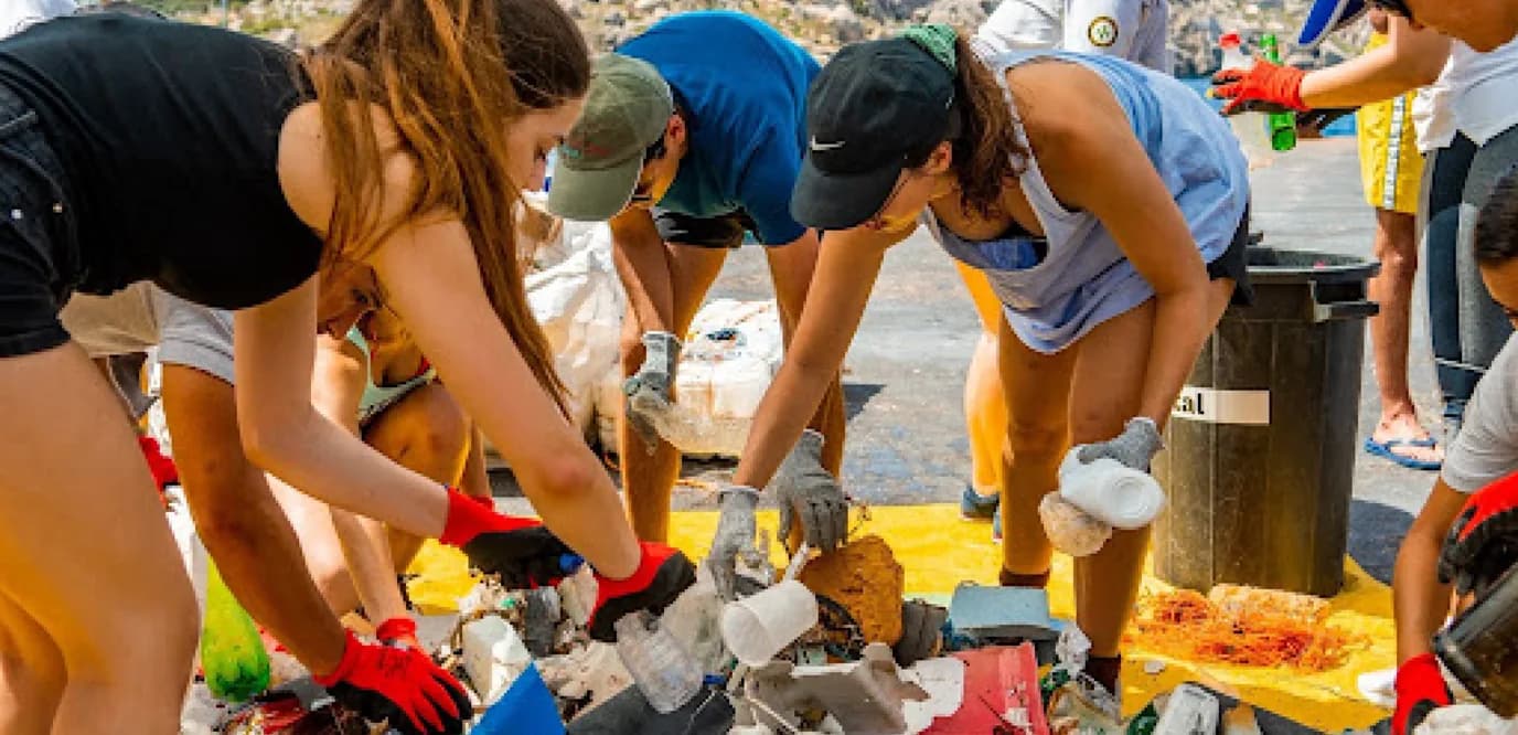 Team sorting collected waste